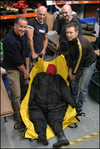 Obese dummy in sling from quitehuman